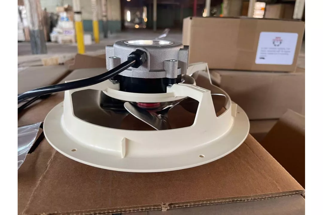 30034-01 motor shown installed in a basket ring with an aluminum fan blade for context